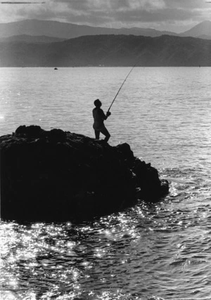 John Lawson fishing at Karaka Bay, Wellington - Photograph taken by Ray Pigney