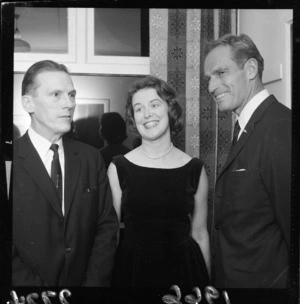 Charlton Heston with Mr and Mrs Newsom at a cocktail reception