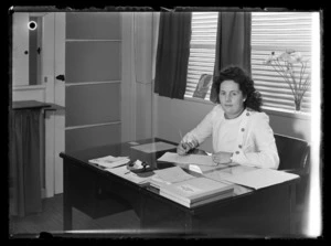 Mrs Constables at her desk, Steeles Corset Factory, Avondale, Auckland