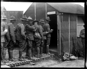 New Zealand troops drawing pay at the reinforcement camp before going on leave