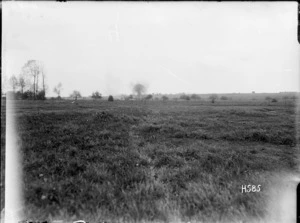 A German shell explodes over a French orchard, World War I