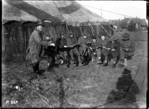 The Kiwis learning their parts for a pantomime during World War I
