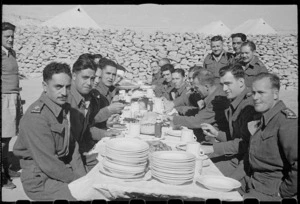 Officers table during Christmas dinner, Maori Training Depot, Maadi military camp, Egypt, during World War II - Photograph taken by George Bull