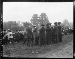 Spectators at a rowing event, England, World War I