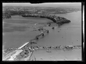 Portions of the span being floated on the Waitemata Harbour during construction of Auckland Harbour Bridge