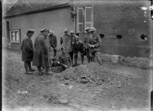 New Zealanders removing a mine from the main street in Esnes, France, World War I