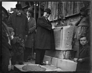 Prime Minister George Forbes laying the foundation stone of the Carillon, the National War Memorial, Buckle Street, Wellington