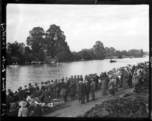 Spectators watch the finish of a rowing race, Walton-on-Thames