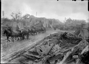 New Zealand transport moving through a recaptured French village, World War I
