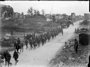 A New Zealand Battalion passing through recaptured Bapaume, World War I