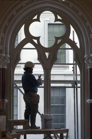 Ian Colquhoun framed by a gothic window