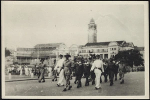 Creator of collection unknown: Japanese marching to Singapore City Hall to surrender, during World War II
