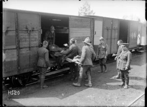A stretcher case loaded on to a hospital train, France