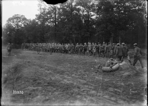 A column of German prisoners passing Havrincourt Wood, World War I