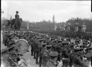 New Zealand troops marching past the gates of Buckingham Palace, London