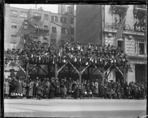 Crowd scene during a military parade in London after World War I
