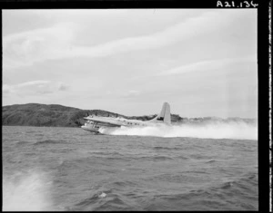 Solent flying boat taking off from Wellington on its first flight of the Wellington-Sydney service - Photograph taken by W Walker