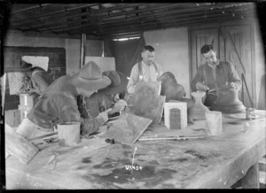 Workshop making stone plaques, England