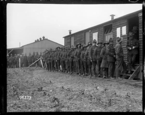 New Zealand soldiers lining up at the camp general store, England