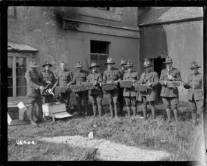 Beehive maintenance at a New Zealand camp, England