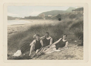 Three men on a beach
