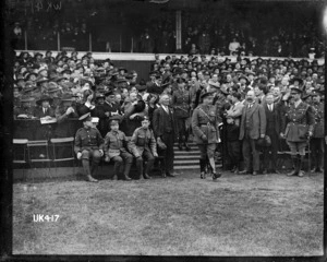 King George V walking onto the Twickenham ground at the Inter Services rugby tournament final, London