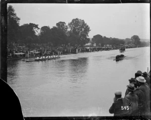 Two rowing eights on the river at the Royal Henley Peace Regatta, England