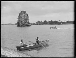 Men in a row-boat on Houhora Harbour, Northland region