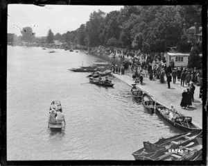 Spectators lining the riverbank at the Royal Henley Peace Regatta, England