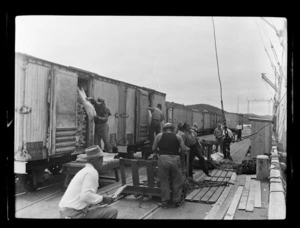 Loading produce onto ship Port Vindex, Opua Wharf, Far North District, Northland Region
