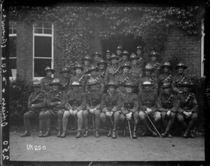 New Zealand officers and NCOs outside a headquarters building in England