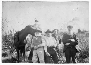 Group including Swiss guide Jakob Lauper, circa 1880s. Location photograph taken unknown. Photographer unidentified.