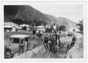 Workers lowering Beach and Wellington Roads, Paekakariki, Kapiti Coast