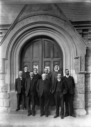 Men on the steps of the Christchurch Magistrates Court