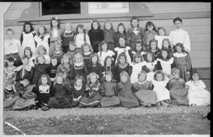 Group of schoolgirls with their teachers, Northland