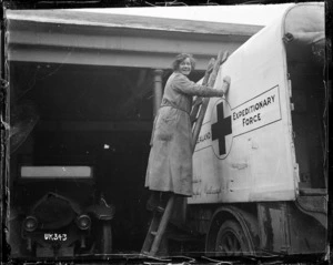 A WAAC cleaning a New Zealand World War I ambulance, England