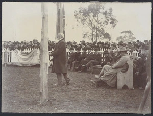 Man speaking at an unidentified tangi, location unidentified