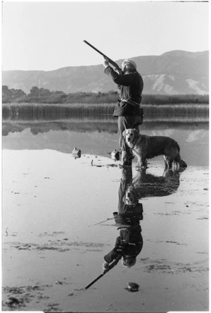 Bruce Coley and his dog Bess duck shooting