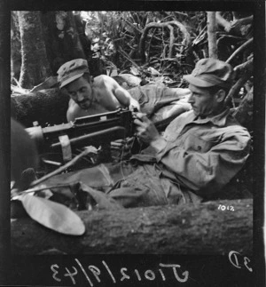 Soldiers and gun, Pacific area, during World War II