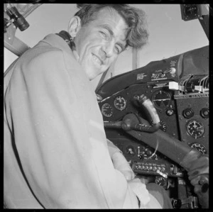 Sir Edmund Hillary in the cockpit of the Trans-Antarctic Expedition's aeroplane, Rongotai, Wellington