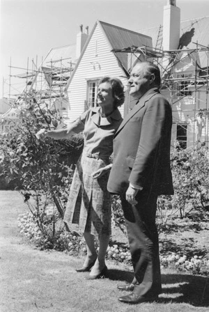 Prime Minister Robert Muldoon, and his wife Thea, outside Vogel House, Lower Hutt