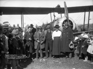 Pilot Thomas Newman, and others, alongside the first aircraft to land at Nelson