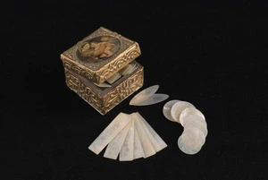 Mansfield, Katherine 1888-1923 (Collector) :[Mother-of-pearl fish and other counters, being contents of ornamental square Italian box. Late eighteenth century to early twentieth century?]