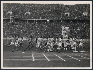 Photograph of Jack Lovelock and the other 1500 metres finalists 300 metres after the start of the Olympic final