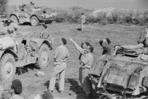 New Zealanders from Divisional Cavalry, near Rimini, Italy, during World War II, watching Allied bombers pass overhead - Photograph taken by George Kaye