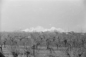 Faenza, Italy, during World War II, with clouds of smoke - Photograph taken by Goerge Frederick Kaye