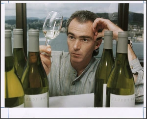 Winemaker Kevin Judd inspects the 1994 Cloudy Bay Sauvignon Blanc - Photograph taken by John Nicholson