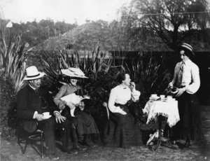 Group having tea outdoors