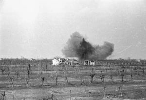 J Short, fl 1945 : 28th NZ (Maori) Battalion local low level bombers score direct hits on an enemy occupied house across the Senio River