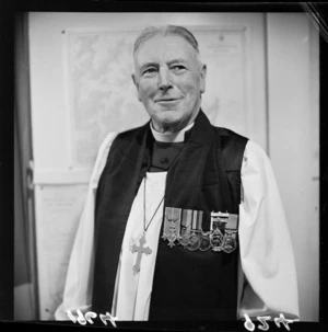 Assistant Bishop of Wellington, the Right Reverend G M McKenzie, after being awarded a clasp for 40 years commissioned service in Naval Volunteer Reserve